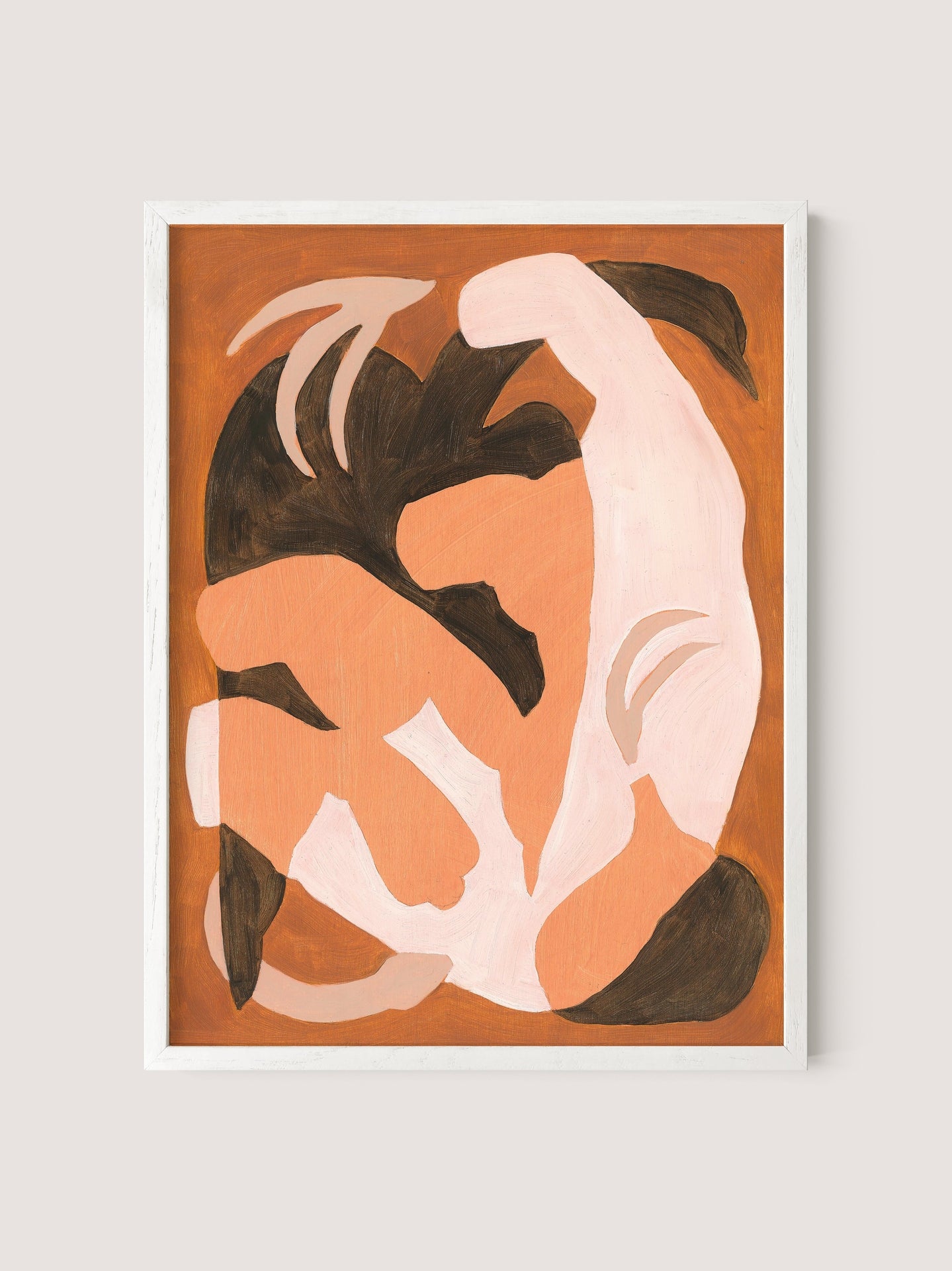 Framed abstract painting with intertwining shapes in peach, brown, and white tones titled "Swan Study I." The shapes flow gracefully like a poetic dance, evoking movement and fluidity against a solid tan background. Available in a White Oak frame.