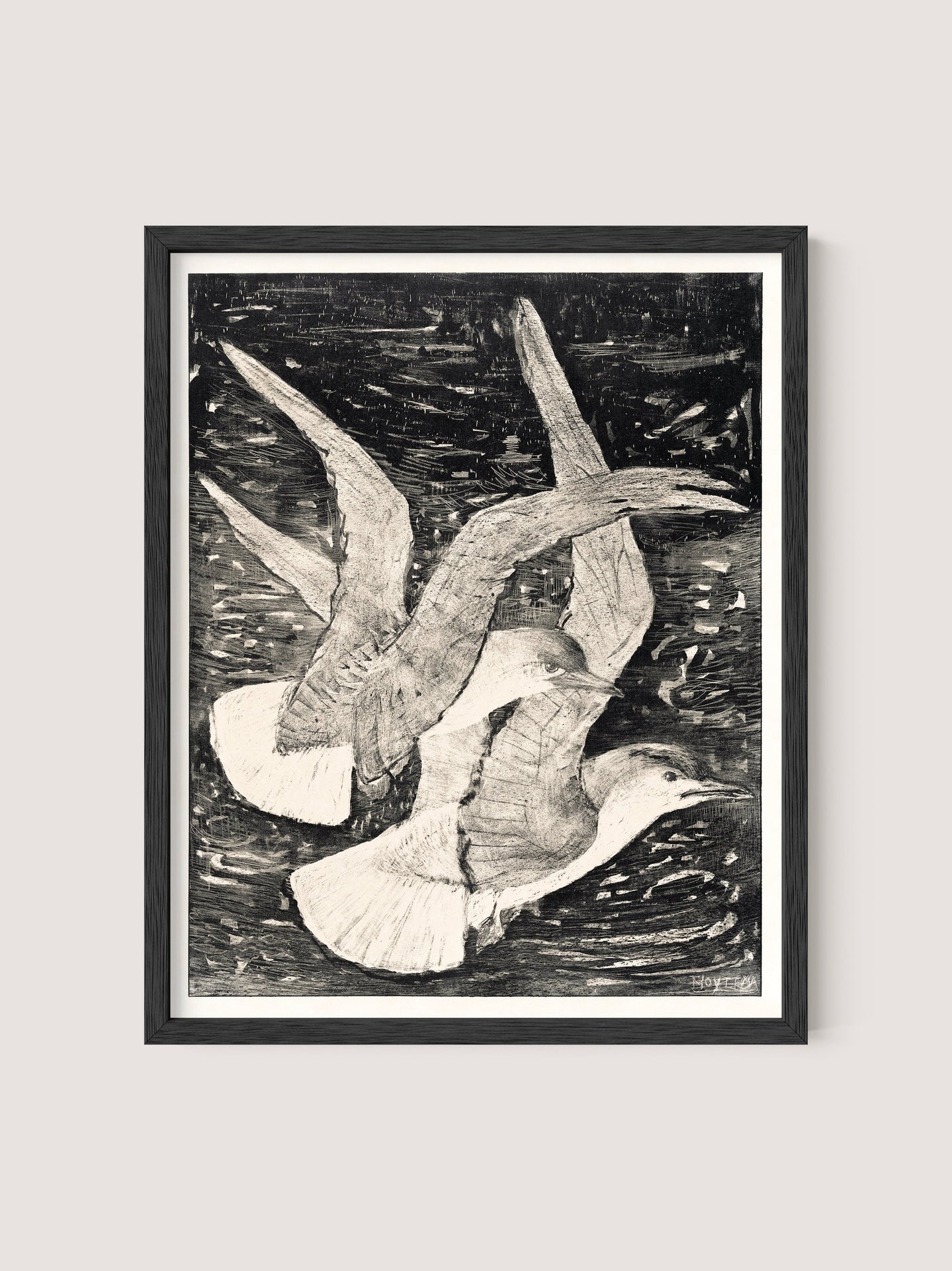 Flying Seagulls," a framed black-and-white drawing by van Hoytema, depicts two seagulls in flight against a textured background. The seagulls have their wings spread wide, and the intricate details capture the motion and grace of their flight within a natural world. The piece is elegantly framed in Black Oak.