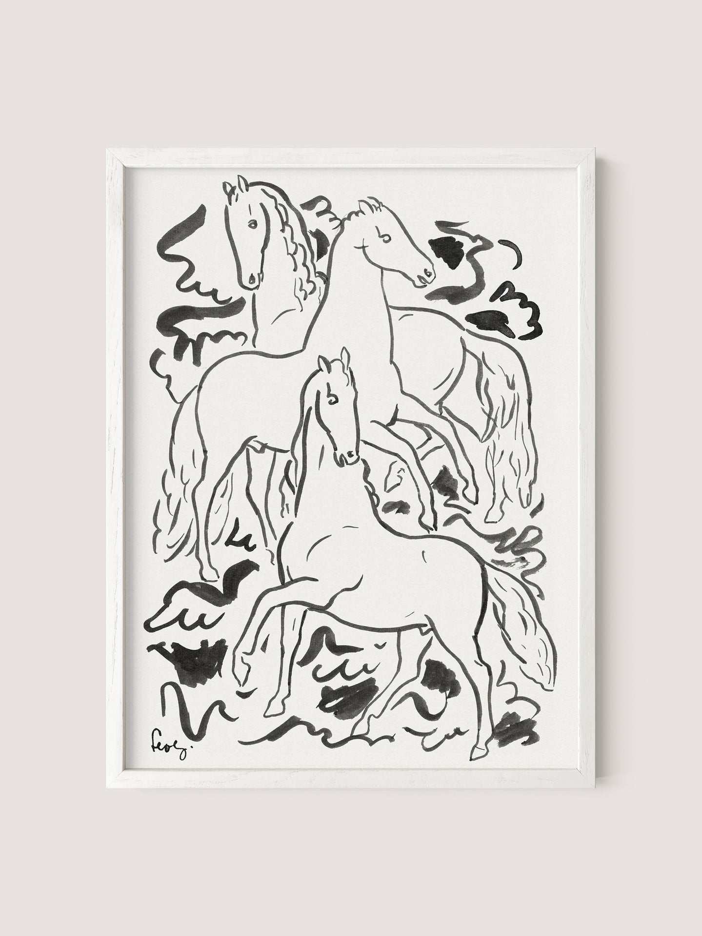 Black and white ink drawing showing three horses in dynamic poses, each with flowing manes and tails. The horses are arranged to give an impression of movement, surrounded by abstract swirls. Reminiscent of Leo Gestel's style, this Three Horses print is framed in a white oak frame.