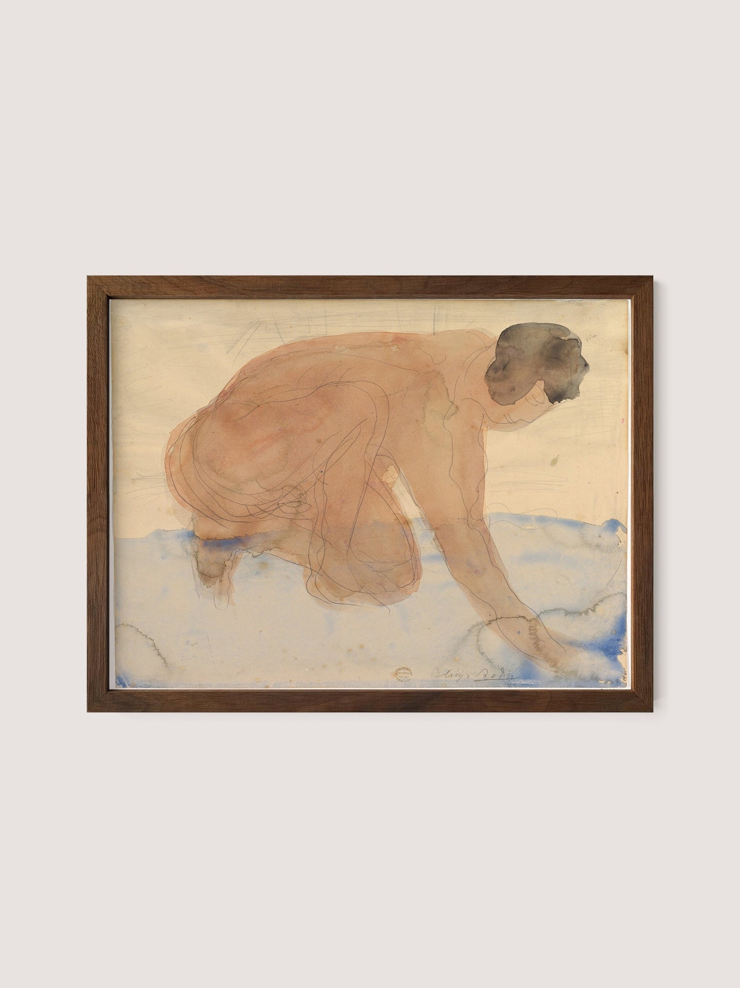 The framed artwork titled &quot;Nude Figure on Hands and Knees&quot; features a semi-transparent nude figure bending down, touching the ground. The figure is depicted with minimal detail, predominantly in warm tones. The marine-inspired backdrop uses light blue and beige hues, suggesting water or sky, all beautifully framed in walnut oak.