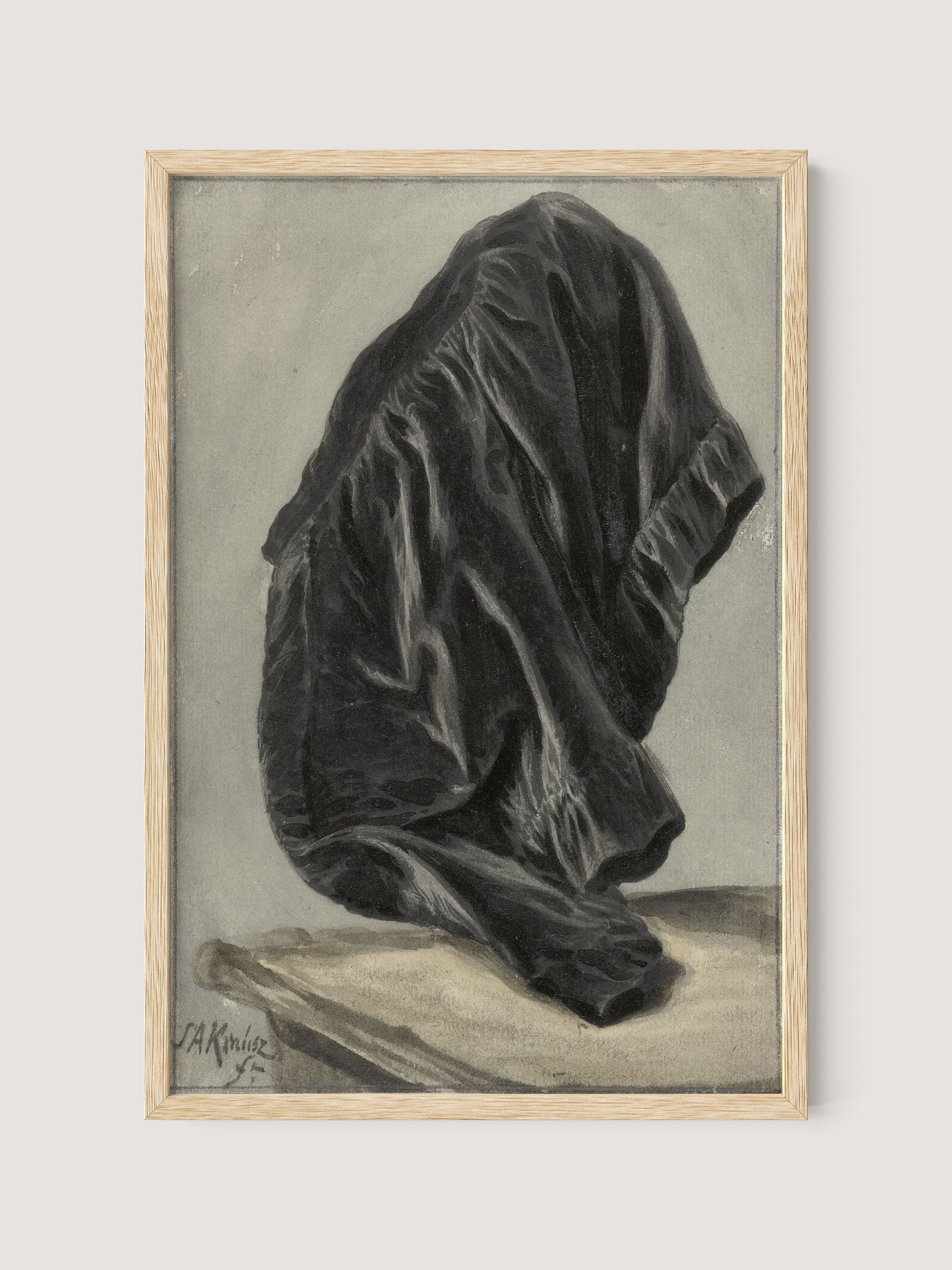 The framed painting "Drape Study" features a monochrome portrayal of black, draped fabric set against a neutral background. The intricate folds in the drapery produce detailed light and shadow effects, lending it a lifelike, three-dimensional quality. The name "A. Rink" is signed in the lower left corner of the Natural Oak frame.