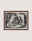 Sleeping Girl," framed artwork by Riva Helfond, depicts a person with a headscarf sleeping on a bed. The figure rests their head on a pillow, with arms folded under their head. This black-and-white piece, featuring a walnut oak frame and evoking the artistic revival of the Works Progress Administration, exudes a calm, peaceful ambiance.