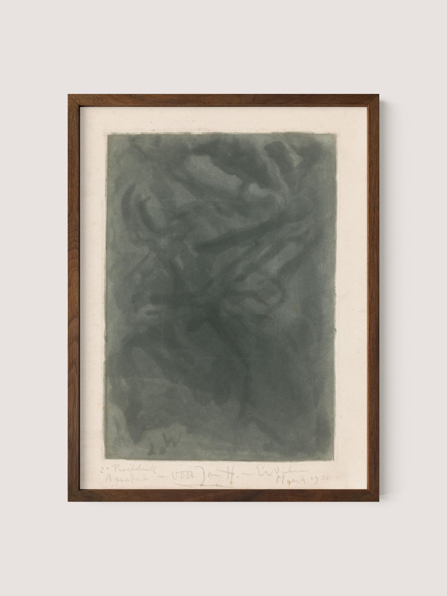 This abstract art piece, titled *Abstract Composition I*, framed in walnut oak, exudes a tranquil wonder with its variations of dark green hues. The texture appears smoky and fluid with indistinct shapes, while handwritten notes and a signature are visible at the bottom of the museum-quality canvas.