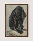 The "Drape Study" painting, mounted in a Walnut Oak frame, portrays a dark, draped cloth enveloping an indistinct form, resulting in an abstract and mysterious shape. The intricate folds of the drapery highlight contrasts between light and shadow. The muted monochrome background ensures focus remains on the central dark and dynamic figure.