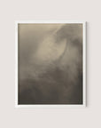 A framed photograph, reminiscent of Alfred Stieglitz's *Songs of the Sky*, features an abstract misty scene with soft, muted tones of gray and beige, evoking a calming and serene atmosphere. Titled "Equivalents," the image is a delicate gelatin silver print, enclosed within a simple White Oak frame and set against an off-white background.