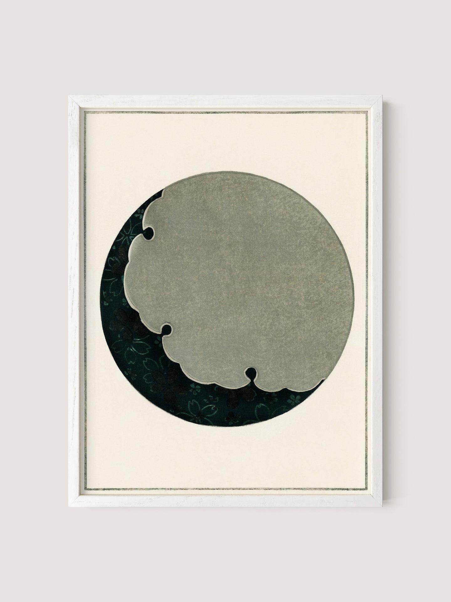 Moon is a framed abstract artwork that draws inspiration from Japanese aesthetics, featuring a large, irregularly shaped gray circle with three small cutouts reminiscent of cloud shapes. The piece is set against a dark, textured background on a cream-colored canvas. Its streamlined white oak frame complements the artwork perfectly, making it an ideal addition to any setting that could grace the pages of a Japanese design magazine like Shin-Bijutsukai.