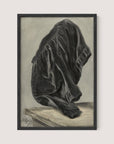 The framed artwork, titled "Drape Study," showcases a draped black cloth in a monochrome study, rendered with realistic precision. The intricate folds and the interplay of light and shadow impart a three-dimensional effect against a muted background. The artist's signature can be seen in the bottom left corner. The frame is made from black oak.