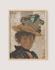 The "Madame Bonnard" framed painting print features a woman named "Madame Bonnard" wearing a large hat adorned with blue ribbon. She is dressed in dark garments set against a textured, muted background. The artist, Edouard Vuillard, has signed the painting in the upper left corner, and it comes in a natural oak frame.