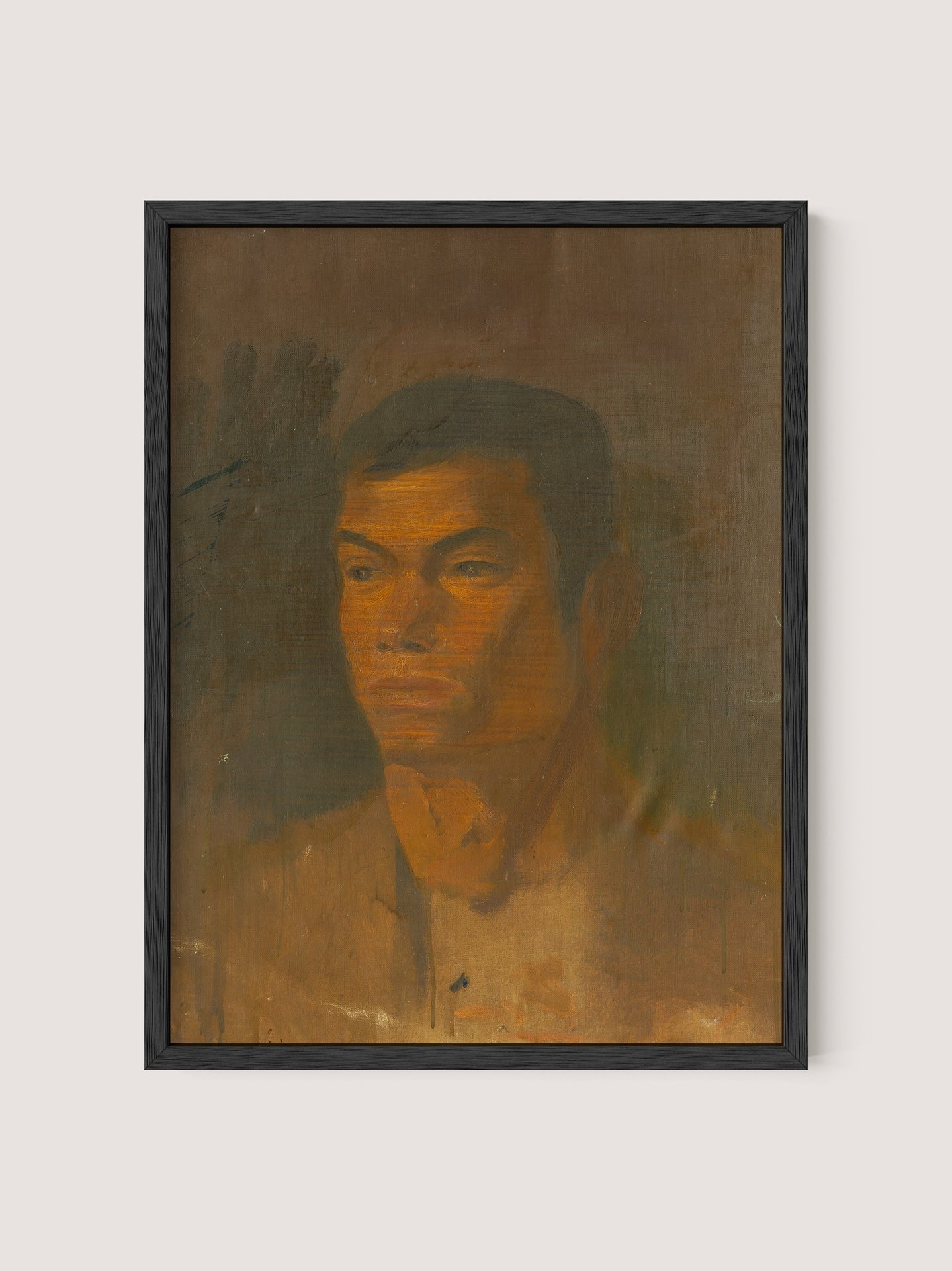 A framed painting titled "Head of a Gypsy Boy" characterized by warm, earthy tones. The young boy has a pensive expression, with prominent shadows defining his facial features. This striking portrait by Ladislav Mednyánszky, set in a black oak frame, features a muted background that blends seamlessly with the sophisticated timeless décor of any space.