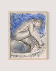 Introducing "The Bath," a framed art piece featuring a sketch of a crouching nude figure with bent knees and hands reaching downward, set against a mesmerizing backdrop of blue and white hues. Rendered in an impressionist style with charcoal and pastel, this artwork exudes refined elegance while being beautifully encased in a natural oak frame.