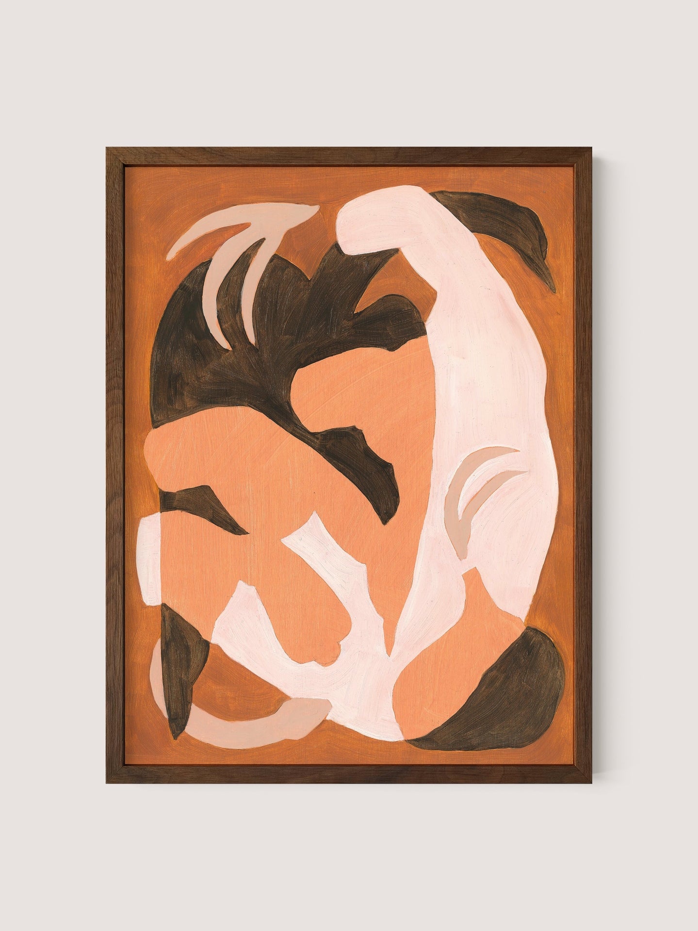 Swan Study I features an abstract composition of intertwined organic shapes in shades of brown, white, and peach, framed in a walnut oak frame against a light gray background. The flat rendering of the shapes creates a sense of fluidity and movement, reminiscent of a poetic dance.