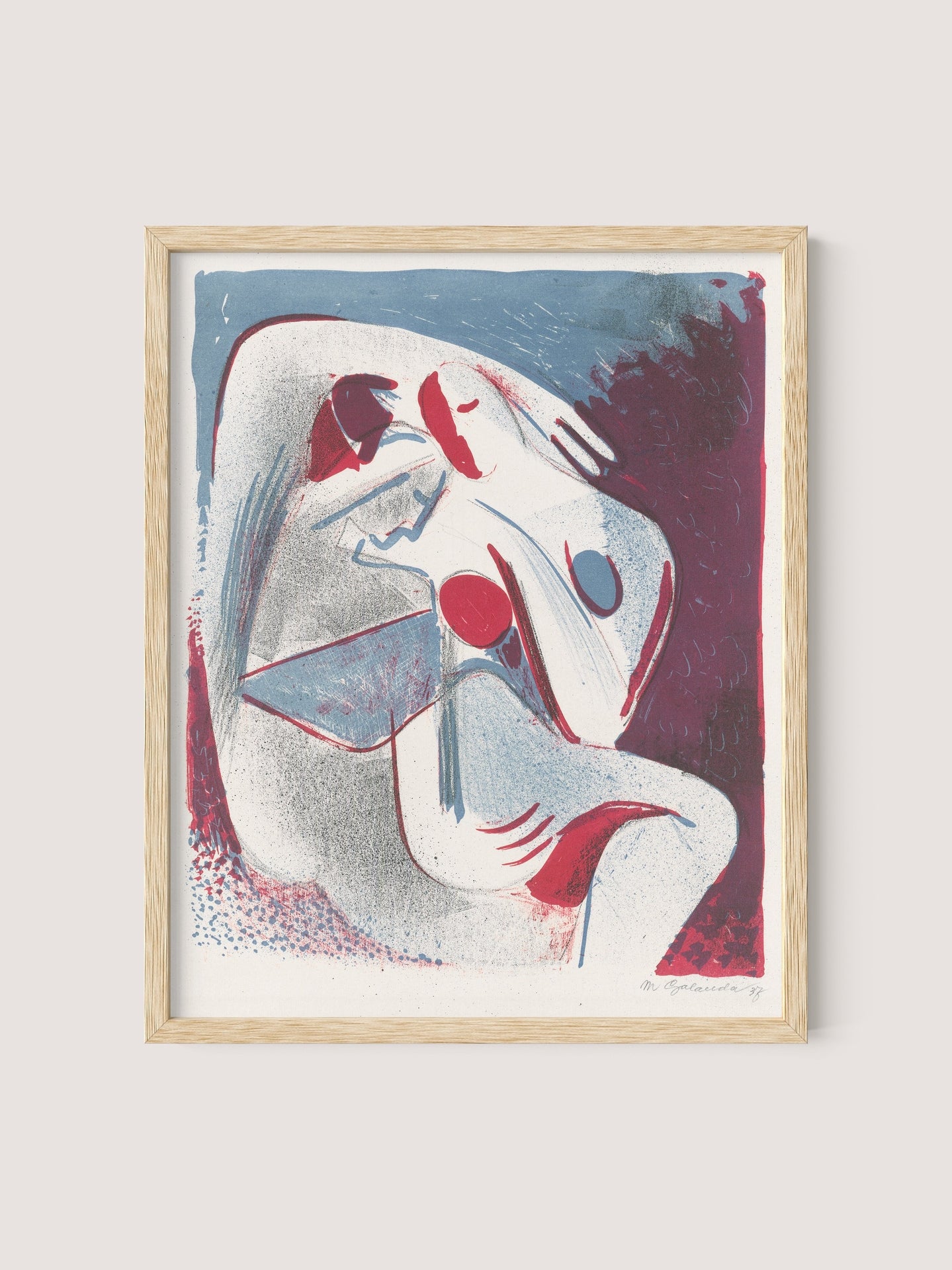 The "Lovers" artwork, framed in natural oak, features intertwining human forms in shades of red, blue, and gray. Reminiscent of a modern yin-yang art style, the dynamic figures are depicted with minimalist features and fluid lines. Ideal for gallery wall decor, this piece adds depth with its transitioning background.