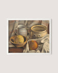 Painting details for *Still Life with Ceramic Pots and Apples*:
The artwork features a still-life scene with a white mug, a large ceramic bowl, and a wooden bowl containing two lemons—one nestled inside the bowl and one partially resting on the white cloth. An apple is positioned close by on the cloth. The composition, set against a soft beige fabric backdrop, radiates neutral warm hues reminiscent of a cozy kitchen or hallway space in harmonious white oak tones.