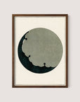 The "Moon" artwork, framed in walnut oak, exudes a Japanese aesthetic with its central large circle. Inside the circle is a cloud-like form against a dark background adorned with faint patterns. The simple wooden frame enhances the monochromatic composition, reminiscent of pieces in Shin-Bijutsukai.