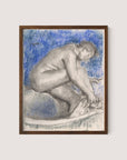 The Bath" is a framed artwork of refined elegance depicting a nude figure crouched down, washing their feet. Rendered in charcoal or a similar medium, the piece features background shading in shades of blue, suggesting water or sky. This artwork exudes intimate introspection and is encased in a simple frame made of walnut oak.